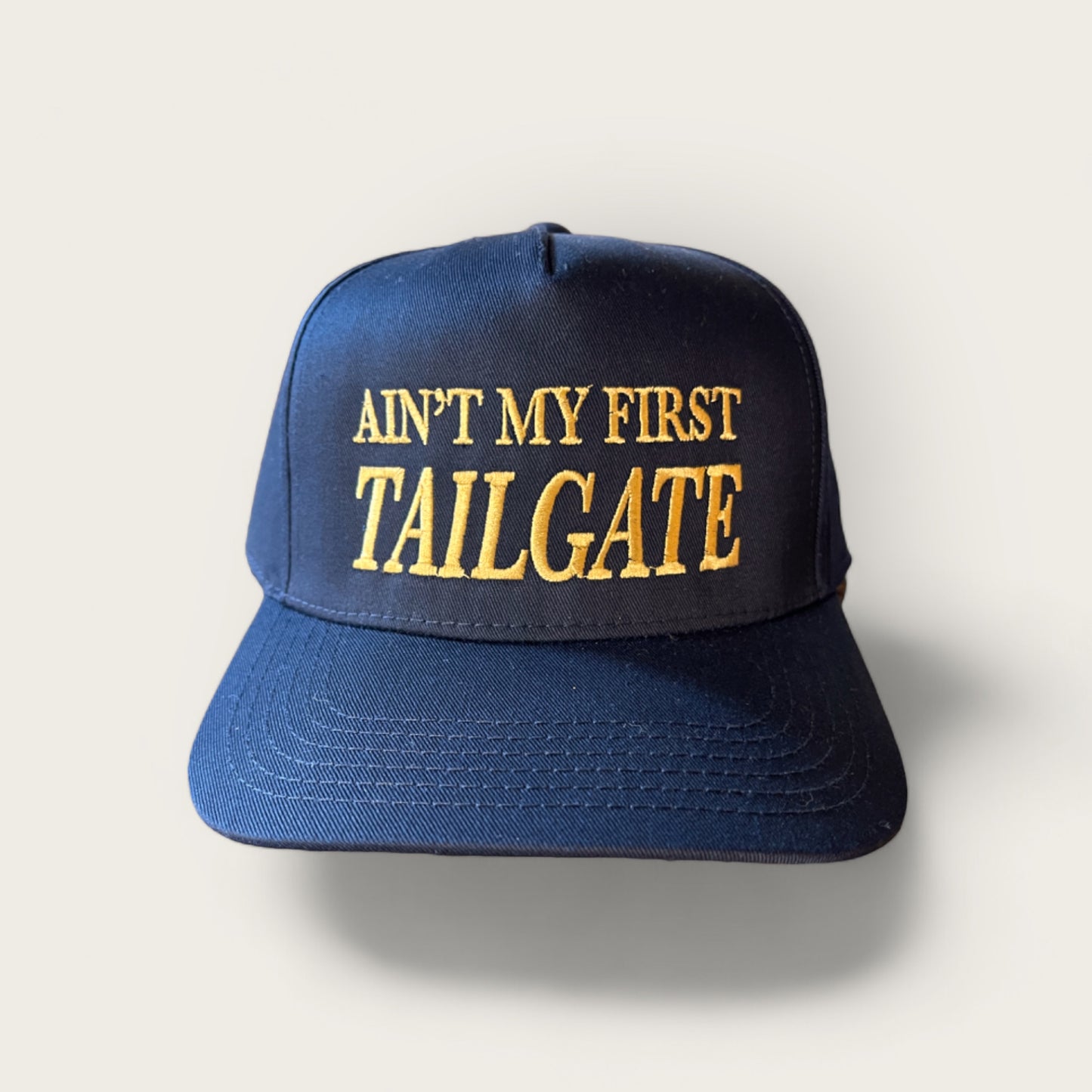 Ain't My First Tailgate Classic Trucker Hat | Customizable